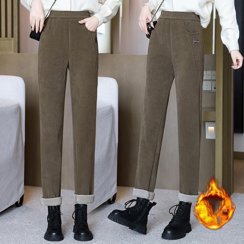 đ„NĆi magas derekĂș meleg nadrĂĄg faux fleece bĂ©lĂ©ssel